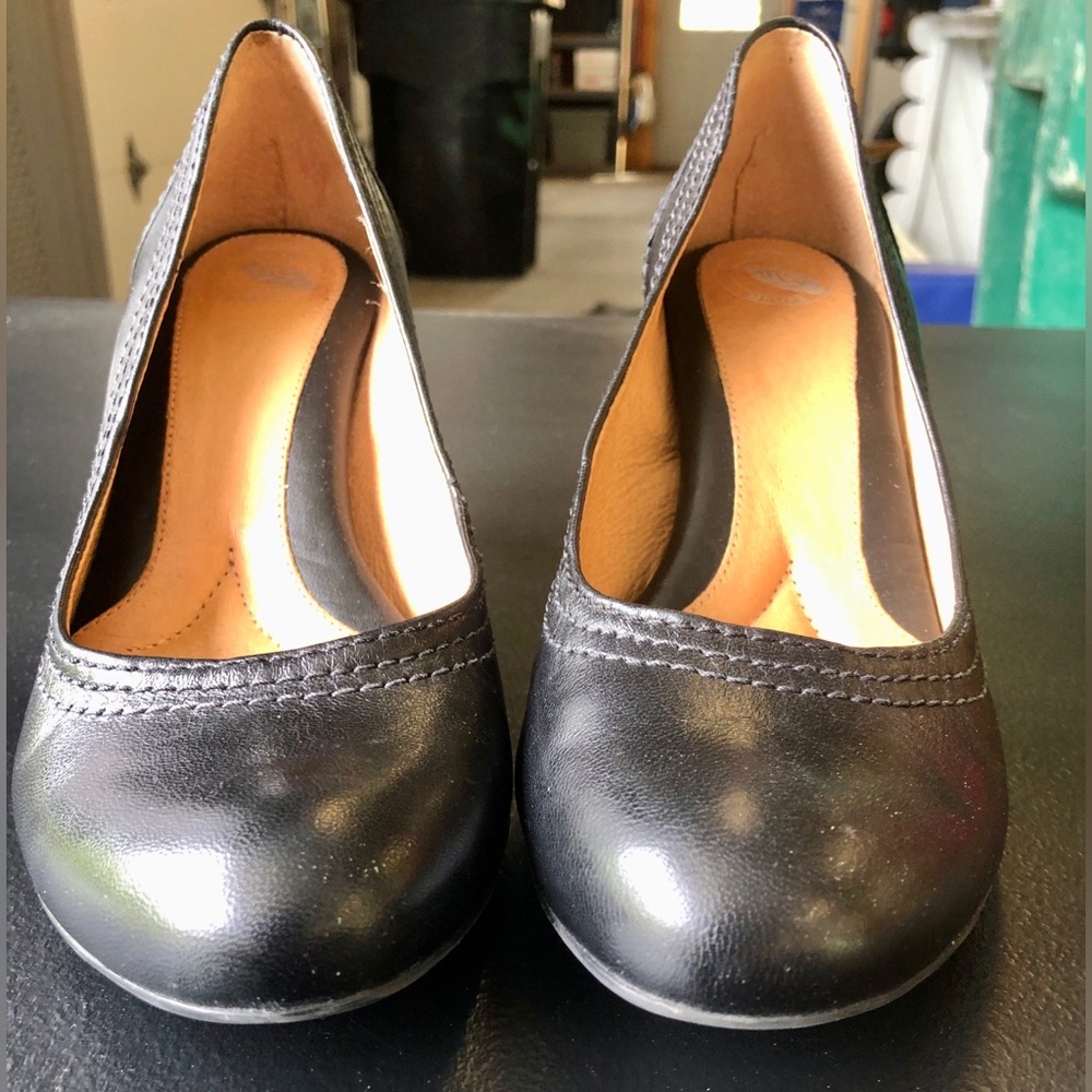Woman’s black pumps